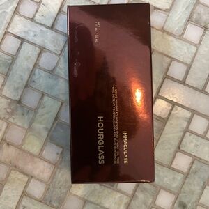 Hourglass Shell Liquid Foundation in Brown Packaging